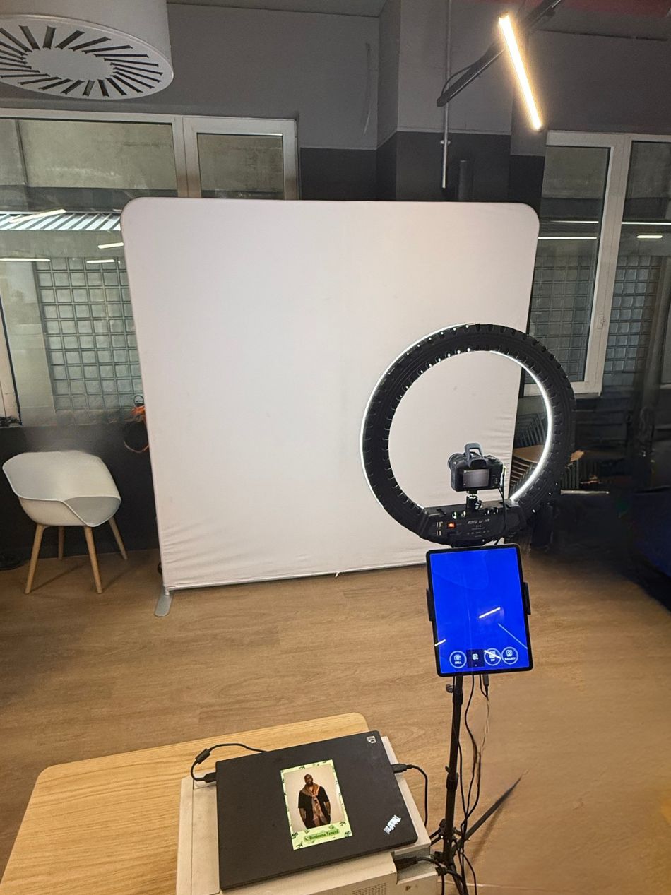 Compact AI photo studio setup with backdrop, ring light and iPad at the Lloyds roadshow