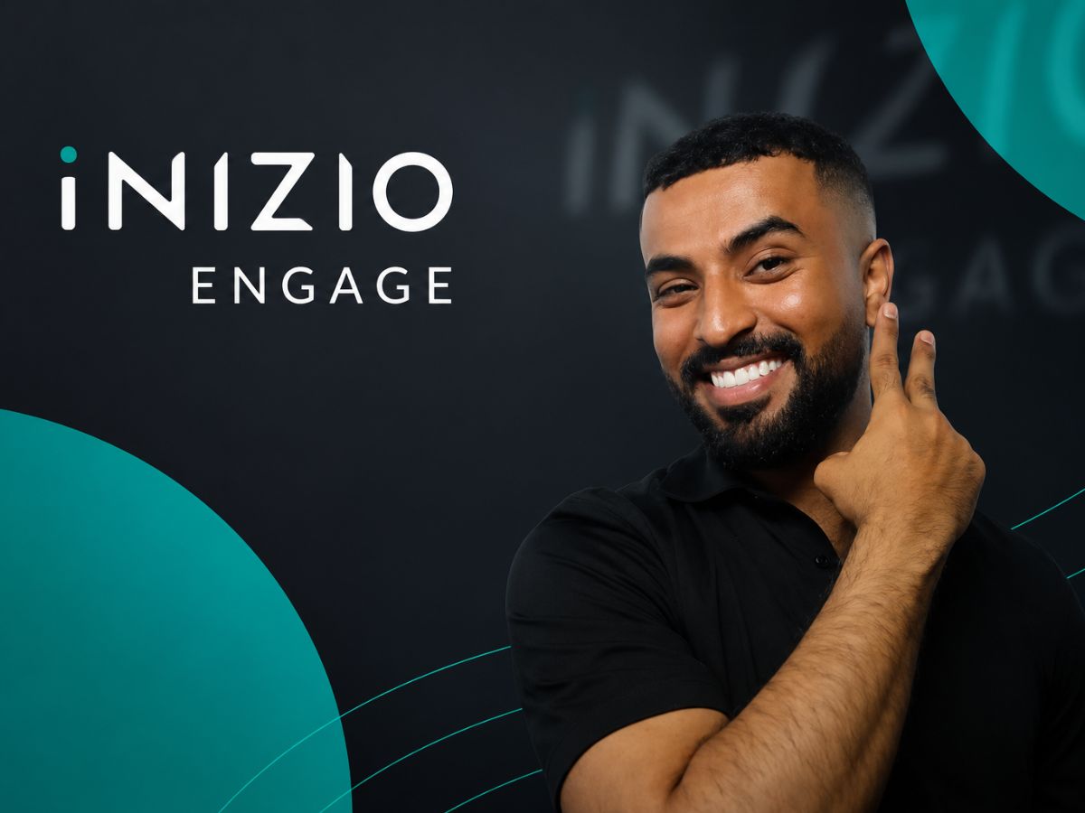 Branded corporate print from a selfie pod showing a guest against an Inizio Engage backdrop