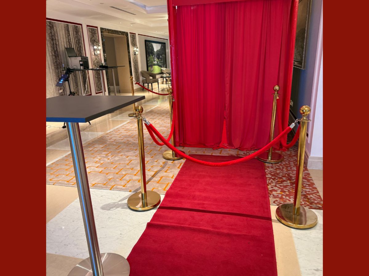 Luxury red-carpet entrance leading into the eBay branded photo experience