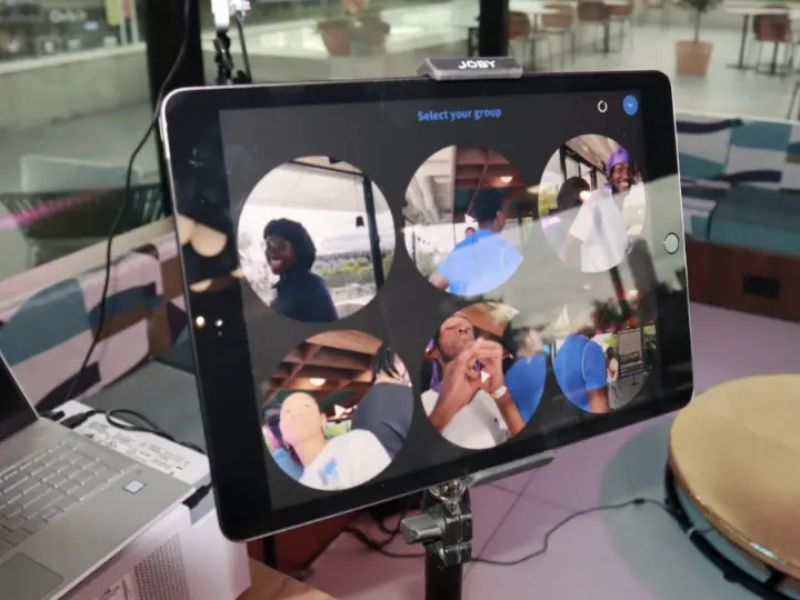 A tablet sharing station displaying 360 videos ready for guests to send to their phones