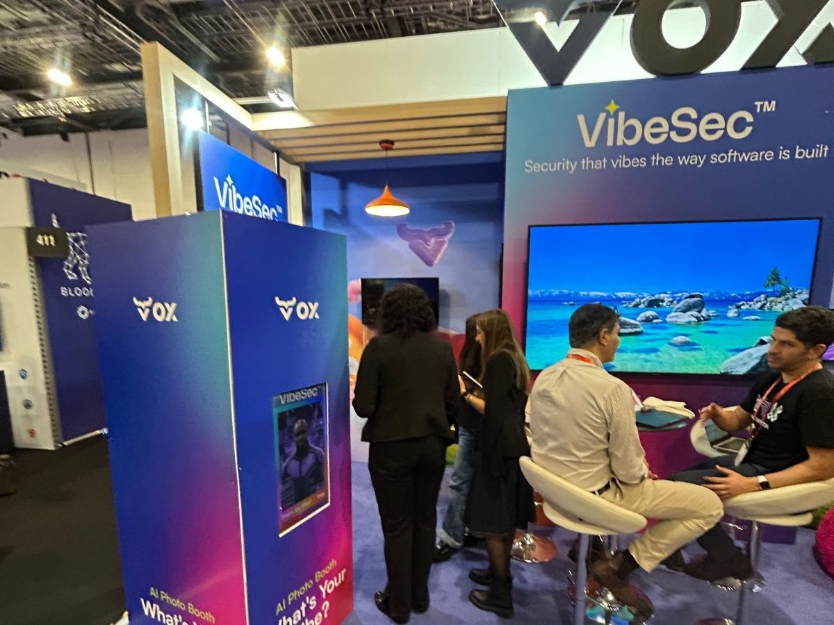 VOX Security exhibition stand with the branded AI photo booth in full operation