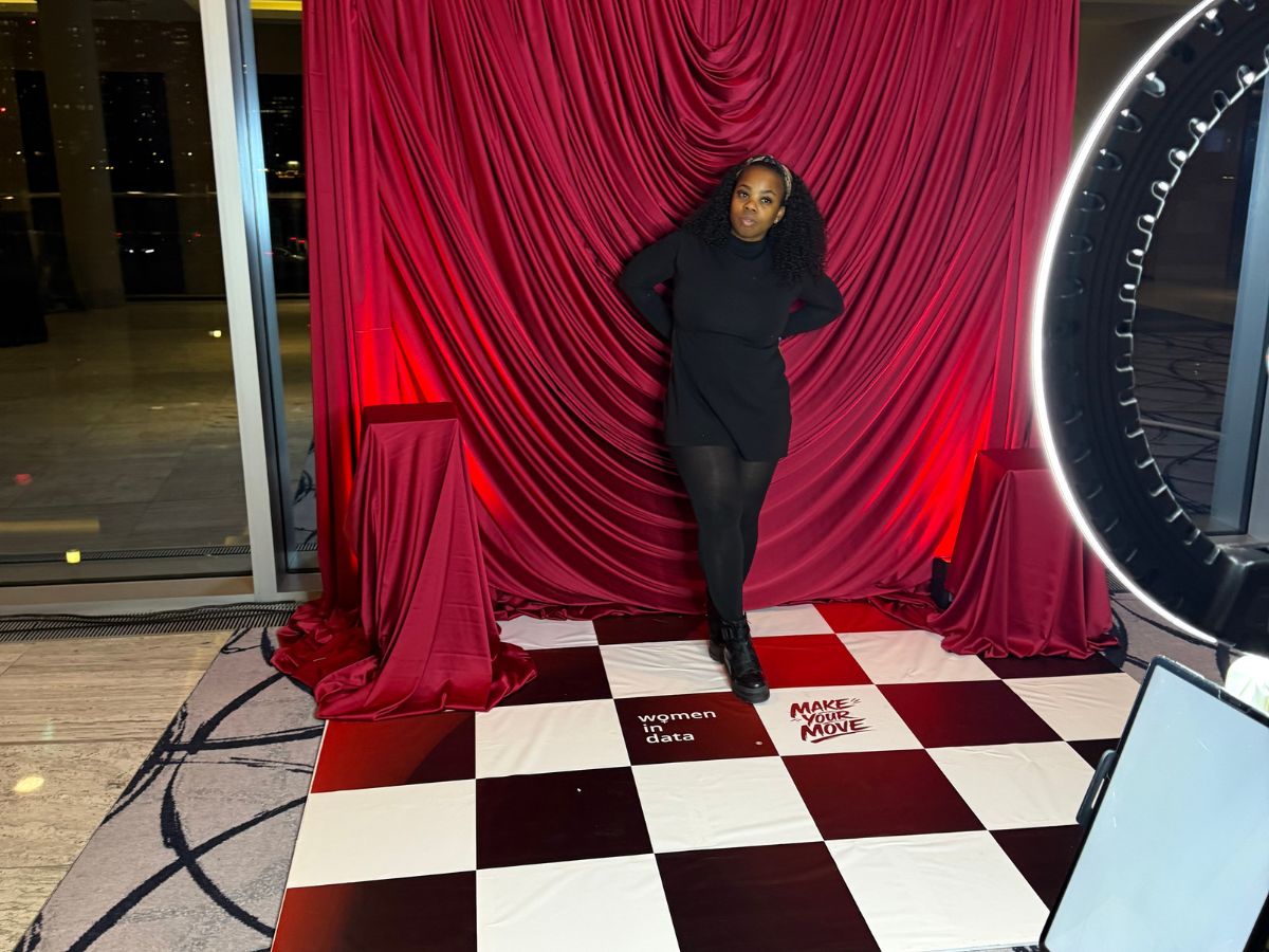 Guest participating in the Women in Data branded photo experience