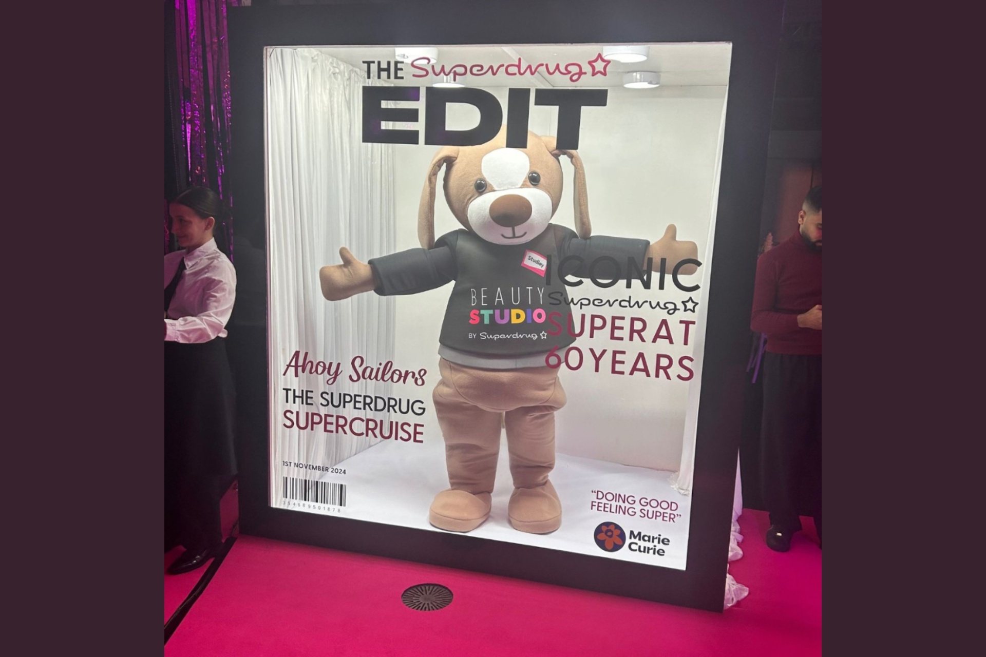 Branded magazine-cover print produced at a supporter celebration event